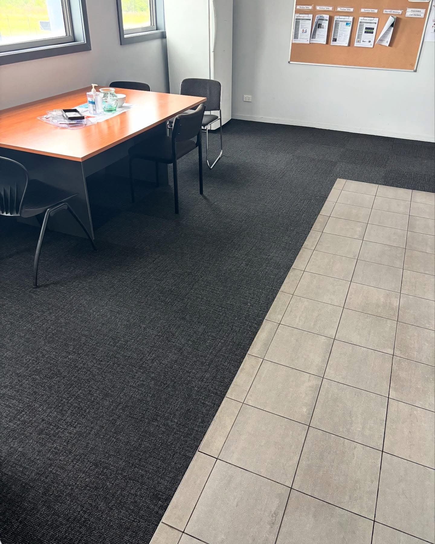 Meeting room carpet to tile transition