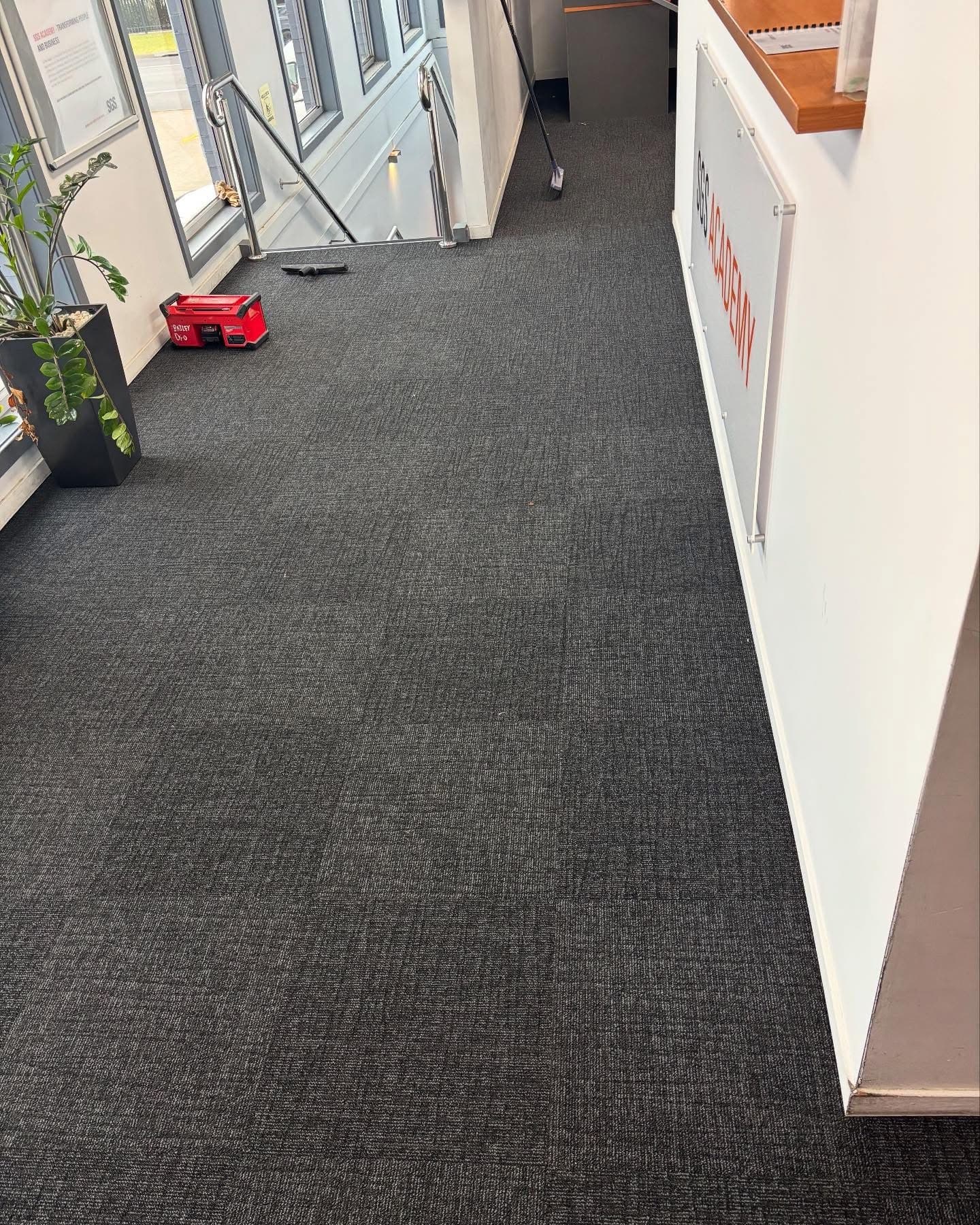 Open plan office carpet installation