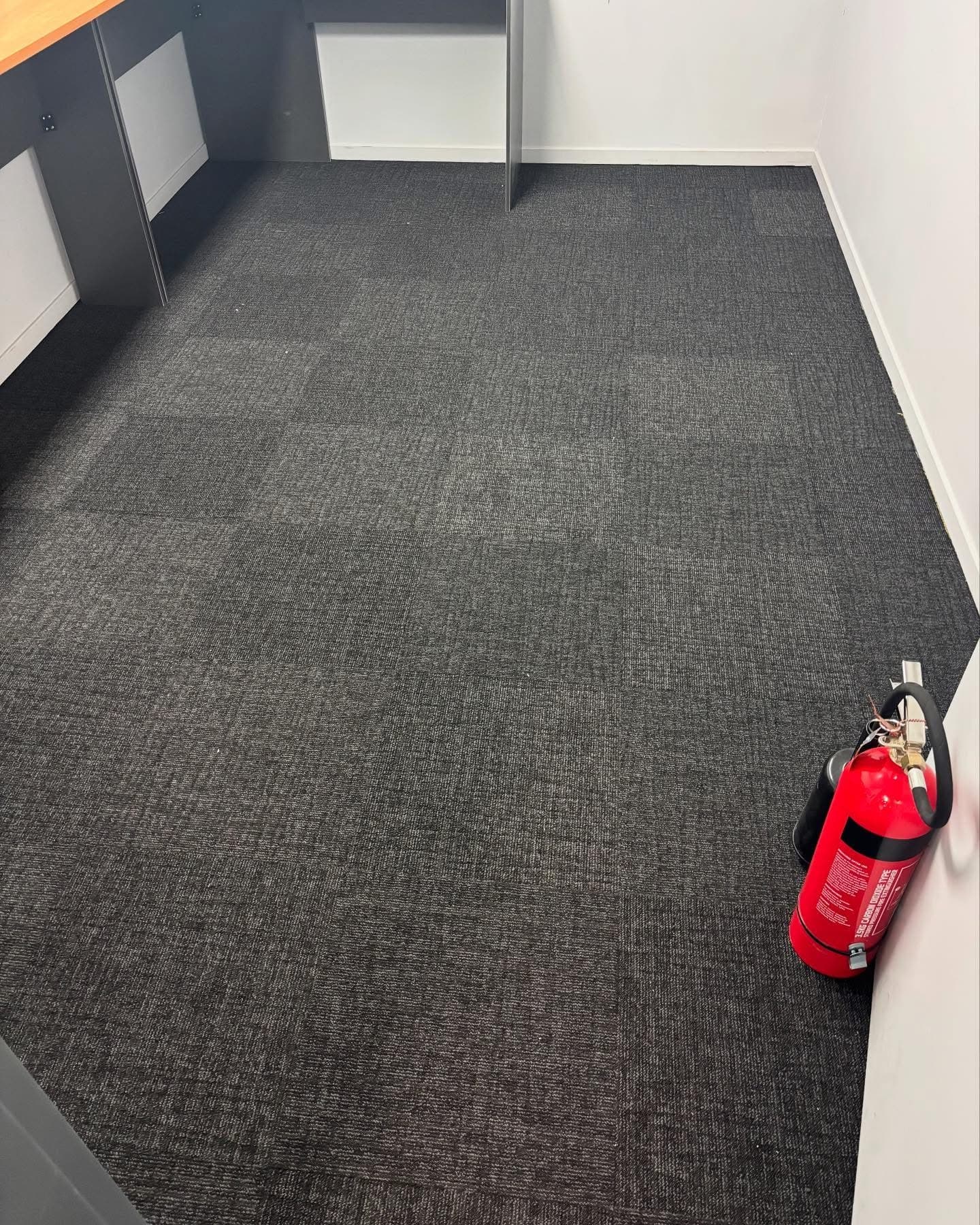 Private office carpet tile installation